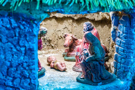 Baby Jesus, Saint Joseph and the Blessed Virgin Mary in Nativity Sceneのeditorial素材