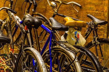 BAGNACAVALLO (RA),ITALY - JANUARY 7, 2018: raindrops are wetting parked bicyclesのeditorial素材