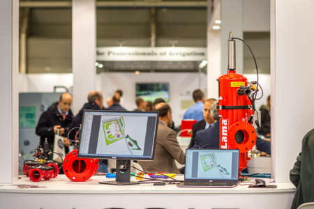 BOLOGNA, ITALY â€“ NOVEMBER 10, 2018:  Booth presenter welcoming business visitors at EIMA...