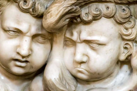 closeup of statues of sad angelsの写真素材