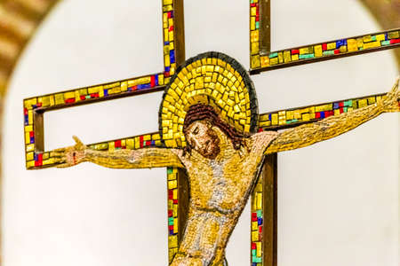 RAVENNA, ITALY - SEPTEMBER 13, 2018: light is enlightening mosaic crucifix in the Church of Saint...