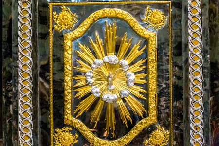 RAVENNA, ITALY - SEPTEMBER 13, 2018: light is enlightening statue of dove in Cathedralのeditorial素材