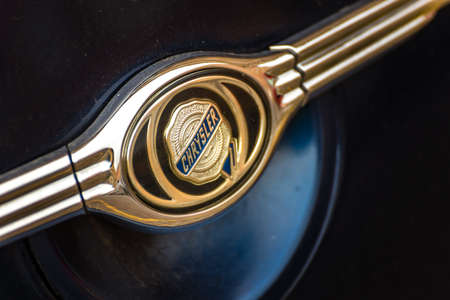 LUGO, ITALY - September 13, 2018: light enlightening Chrysler logo on a car bodyのeditorial素材