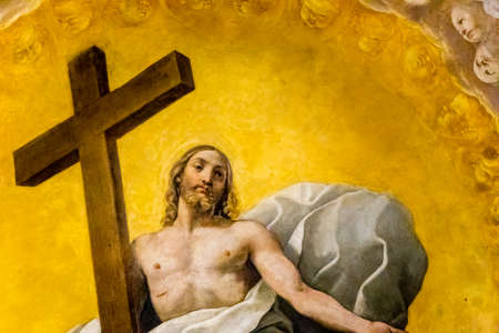 RAVENNA, ITALY - SEPTEMBER 13, 2018: light is enlightening painting of Jesus Christ holding Cross in Cathedralのeditorial素材