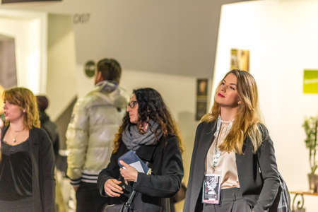 BOLOGNA, ITALY - NOVEMBER 25, 2018: people visiting the exhibition