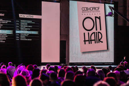 BOLOGNA, ITALY - NOVEMBER 25, 2018: Large displays and theatre lights enlightening catwalk.のeditorial素材