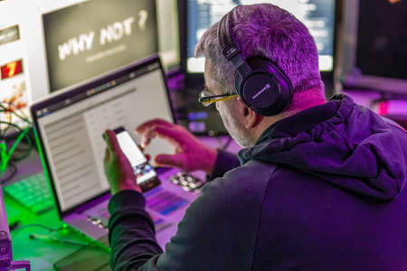 BOLOGNA, ITALY - NOVEMBER 25, 2018: technicians at work during the show.のeditorial素材