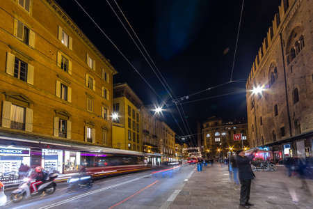 BOLOGNA, ITALY - DECEMBER 10, 2018: Christmas lights are enlightening people walking in shopping street in historical center of Bolognaのeditorial素材
