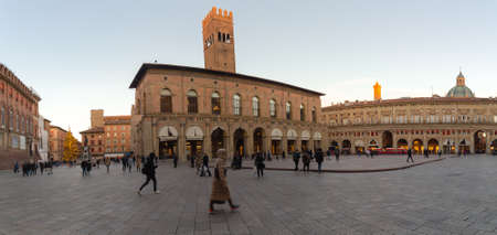 BOLOGNA, ITALY - DECEMBER 10, 2018: Christmas lights are enlightening people walking in Piazza Maggiore, main attraction in historical center of Bolognaのeditorial素材