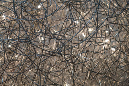light bulbs in a tangle of wiresの写真素材