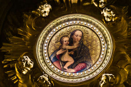 ROME, ITALY - JANUARY 1, 2019: light is enlightening painting of the Virgin Mary holding Baby Jesus in the basilica of Santo Andrea Della Valle in Santo Eustachio districtのeditorial素材