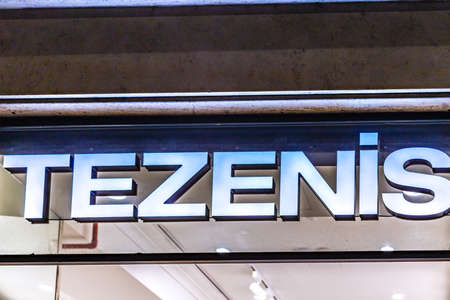 ROME, ITALY - JANUARY 3, 2019: lights are enlightening TEZENIS logo on storefront at night