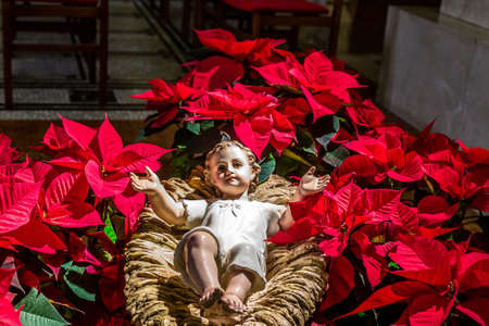 ROME, ITALY - JANUARY 2, 2019: light is enlightening statue of Holy Child in Santa Maria Liberatrice church in Testaccio districtのeditorial素材