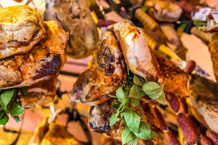 hanged meat for sale in Italian butcher Shopの写真素材