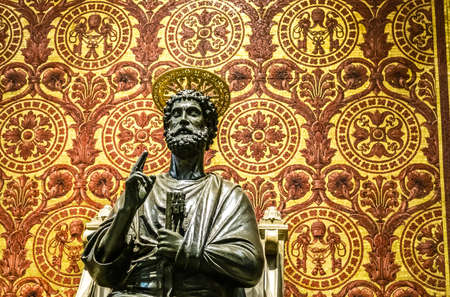 VATICAN - JANUARY 2, 2019: lights are enlightening statue in Saint Peter Basilica in Vatican Cityのeditorial素材