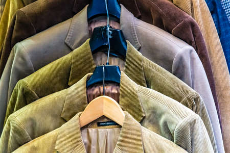 Velvet jackets on hangers for sale in Italian shopの写真素材