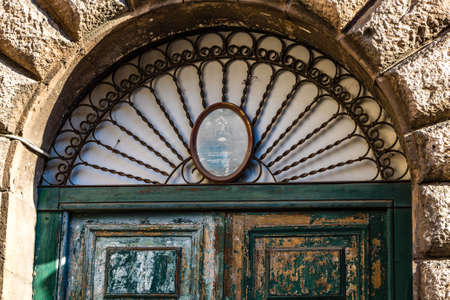 ROME, ITALY - JANUARY 2, 2019: light is enlightening the entry door of the Georgia Embassy in Romeのeditorial素材
