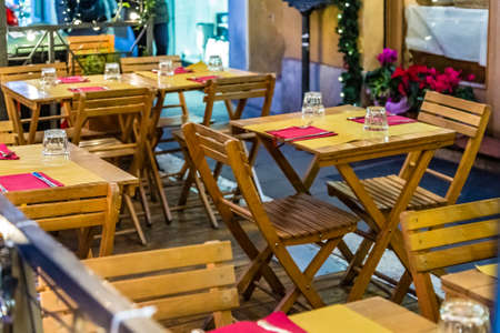 tables and chairs of Italian Restaurant at Christmasのeditorial素材