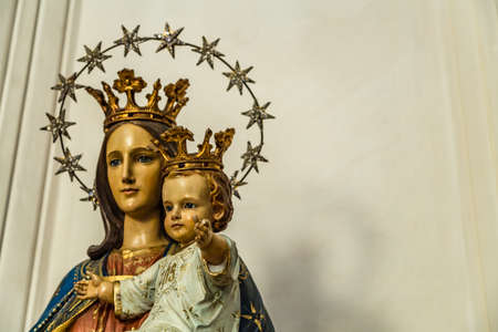 CASTEL GANDOLFO (ROME), ITALY - JANUARY 3, 2019: light is enlightening statue of The Blessed Virgin Mary holding Baby Jesus in Church of Saint Thomas from Villanova in Castel Gandolfoのeditorial素材