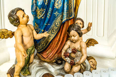 CASTEL GANDOLFO (ROME), ITALY - JANUARY 3, 2019: light is enlightening statues of angels in Church of Saint Thomas from Villanova in Castel Gandolfoのeditorial素材