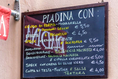 RAVENNA, ITALY - JANUARY 15, 2019: light is enlightening meals of menu of piadina shopのeditorial素材