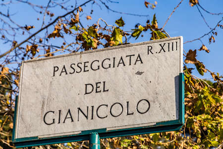 enlightening  street name sign of PASSEGGIATA DEL GIANICOLO in Romeの写真素材