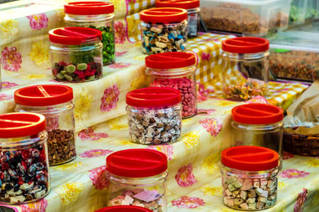 ROME, ITALY - JANUARY 4, 2019: jars of sweets for sale on shelves in Italian shopのeditorial素材