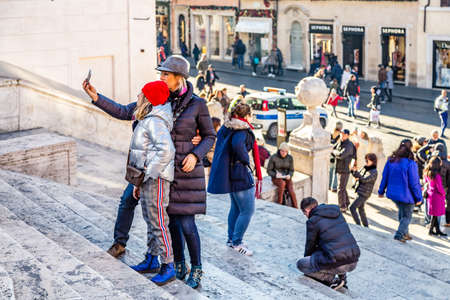 ROME, ITALY - JANUARY 6, 2019: tourists walking in PIAZZA DEI TRINITA DEI MONTI