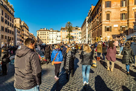 ROME, ITALY - JANUARY 6, 2019: tourists walking in PIAZZA DEI TRINITA DEI MONTI