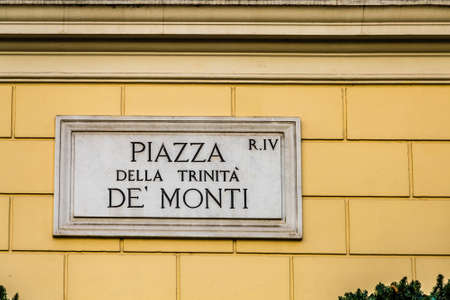 ROME, ITALY - JANUARY 6, 2019: light is enlightening  street name sign of PIAZZA DELLA TRINITA DEI MONTI in Romeのeditorial素材
