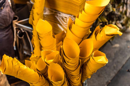 yellow paper cones for finger foodの写真素材
