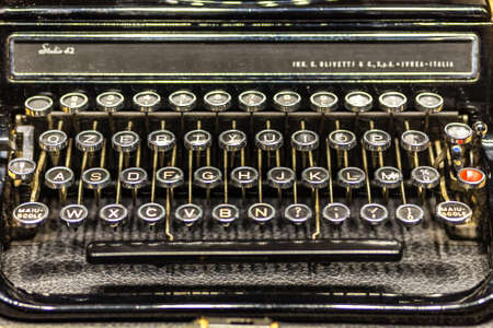 RAVENNA, ITALY - JANUARY 17, 2019: The dust and the signs of the time cover the keys of an old...