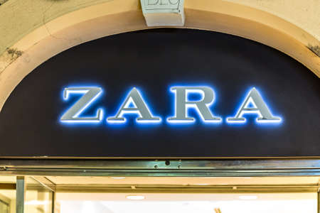RAVENNA, ITALY - JANUARY 17, 2019: lights are enlightening ZARA logo on storefrontのeditorial素材