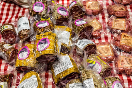 BOLOGNA, ITALY - DECEMBER 16, 2018: SERGIO FALASCHI is selling pork pepperoni at FICO Eataly World, the largest gourmet agri-food park in the worldのeditorial素材