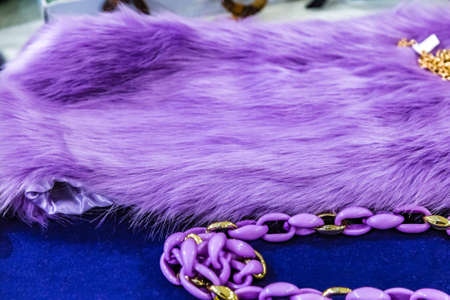 closeup of classy purple fur and chainの写真素材