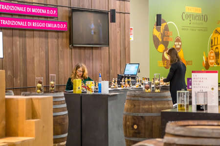 BOLOGNA, ITALY - DECEMBER 16, 2018: clerks setting shop at FICO Eataly World, the largest gourmet...