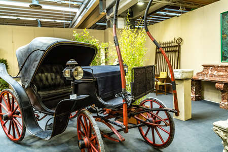 MODENA, ITALY â FEBRUARY 15, 2019:  Unusual vintage artworks offered for sale by antique dealers in Petra Fair, antique furniture, decoration and design for parks and gardensのeditorial素材