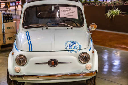 BOLOGNA, ITALY - DECEMBER 16, 2018: lights are enlightening Fiat 500 Car advertising Baladin Beer at FICO Eataly World, the largest gourmet agri-food park in the worldのeditorial素材