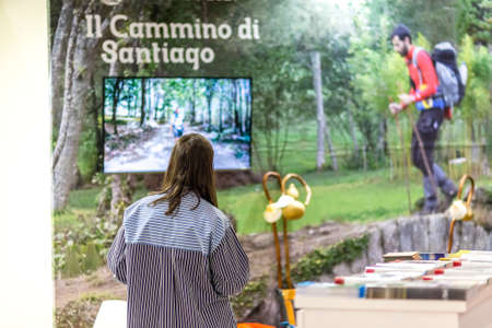 BOLOGNA, ITALY - FEBRUARY 18, 2019: booth presenter waiting for visitors at stand of  Way of Saint James in DEVOTIO Religious products and service exhibitionのeditorial素材