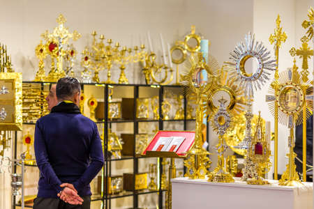 BOLOGNA, ITALY - FEBRUARY 18, 2019: visitor visiting stand of NAPOLETANA ARTE SACRA in DEVOTIO...