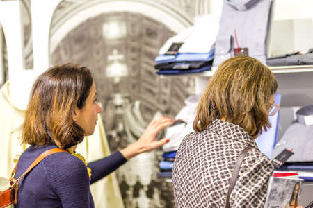 BOLOGNA, ITALY - FEBRUARY 18, 2019: visitors visiting stand of ECCLESIA in DEVOTIO Religious products and service exhibitionのeditorial素材