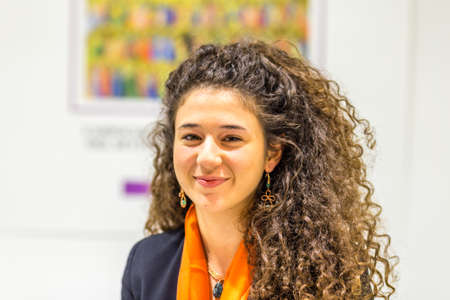 BOLOGNA, ITALY - FEBRUARY 18, 2019: booth presenter waiting for visitors at stand of ASSORELLI in DEVOTIO Religious products and service exhibitionのeditorial素材