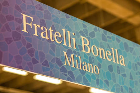 BOLOGNA, ITALY - FEBRUARY 18, 2019: lights are enlightening FRATELLI BONELLA logo on signboard on...
