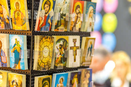BOLOGNA, ITALY - FEBRUARY 18, 2019: lights are enlightening pictures at stand of EGIM in DEVOTIO Religious products and service exhibitionのeditorial素材
