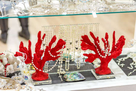 BOLOGNA, ITALY - FEBRUARY 18, 2019: lights are enlightening rosaries at stand of MRP in DEVOTIO Religious products and service exhibitionのeditorial素材