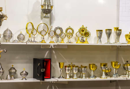 BOLOGNA, ITALY - FEBRUARY 18, 2019: lights are enlightening monstrances at stand of in DEVOTIO Religious products and service exhibitionのeditorial素材