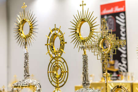 BOLOGNA, ITALY - FEBRUARY 18, 2019: lights are enlightening monstrances at stand of BERTONCELLO, in DEVOTIO Religious products and service exhibitionのeditorial素材