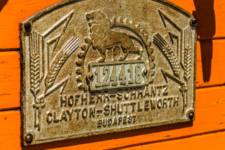 ALFONSINE (RA), ITALY - MAY 16, 2019: sunlight is enlightening a very old threshing machine by Hofherr-Schrantz-Clayton-Shuttleworth Budapest at Sagra delle Alfonsine Country Festival in Italyのeditorial素材