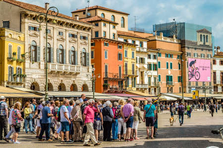 VERONA (VR), ITALY - MAY 10, 2019: tourists having fun and walking in Piazza Bra, square of the Arena in historical center of Verona, city of loversのeditorial素材