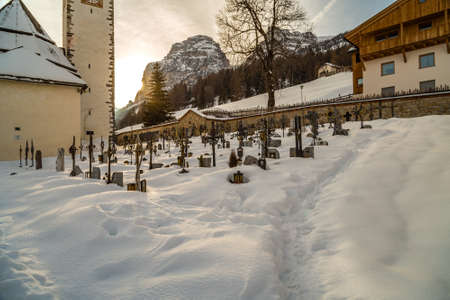 LA VILLA (BZ), ITALY - FEBRUARY 9, 2019: snow covering the cemetery and the Parish church of Our Lady of La Villaのeditorial素材